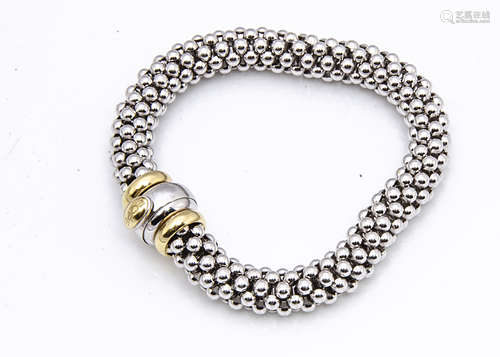 An 18ct gold two colour gold bracelet by Fope, of cylindrical chain metal style links with barrel