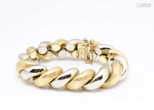 A continental two coloured stylised rope twist bracelet, marked 18K 750 Italy, in textured yellow