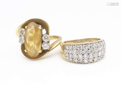 A 9ct gold and cubic zirconia dress ring, ring size N, 5.1g together with a 14ct citrine and topaz