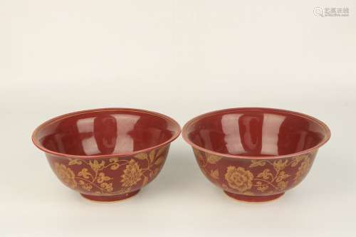 A Pair Of Red Glazed Gold-Decorated Porcelain Bowls