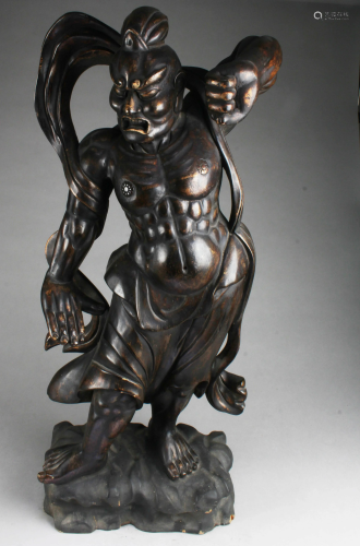 A Wooden Crafted Deity Statue