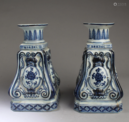 A Pair of Chinese Blue & White Candle Holders