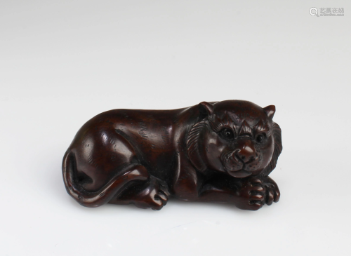 A Carved Wooden Animal Figurine