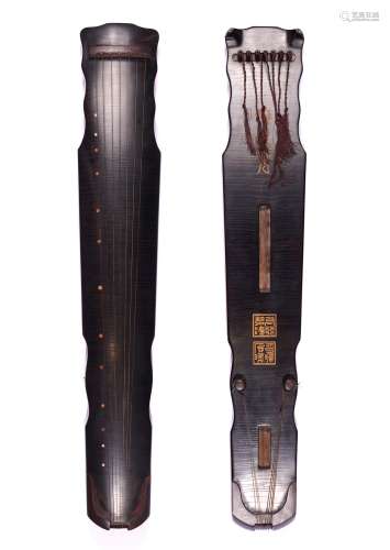 A CHINESE BLACK LACQUERED 'PEARL-STRING' TYPE GUQIN