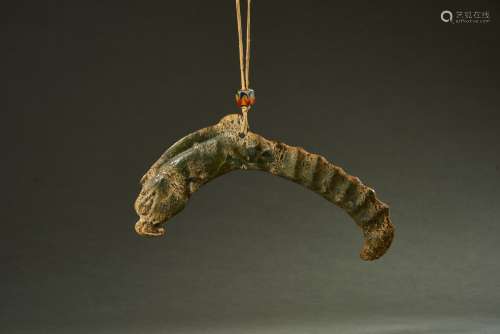 A JADE CARVING OF 'EAGLE-HEAD' DRAGON PENDANT