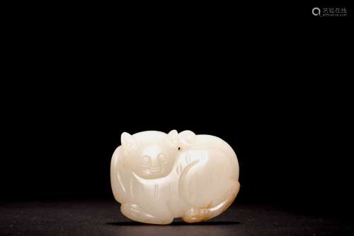 A CHINESE WHITE JADE 'TIGER CUB' PENDANT