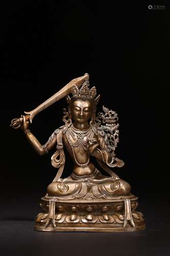 A SILVER FIGURE OF SEATED MANJUSRI