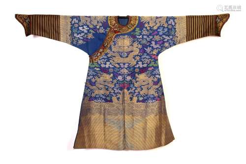 A CHINESE BLUE GROUND EMBROIDERED DRAGON ROBE