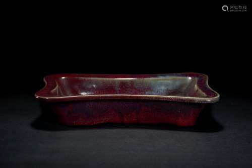 A RED AND VIOLET GLAZED PLANTER