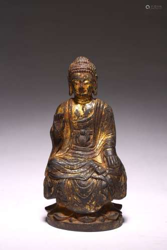 A CHINESE GILT BRONZE FIGURE OF SHAKYAMUNI