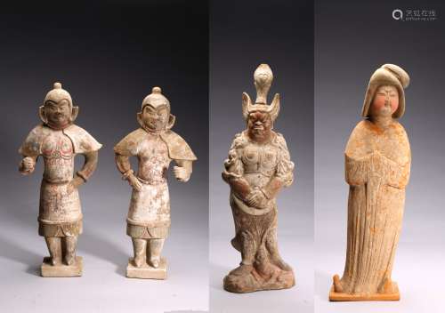 A SET OF FOUR PAINTED POTTERY FIGURES