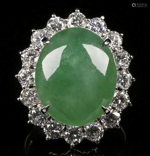 A JADEITE AND DIAMOND RING WITH PLATINUM