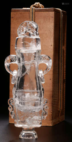 A CRYSTAL VASE WITH BEAST EARS