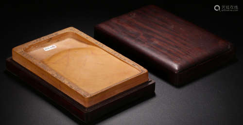 AN INK SLAB CARVED WITH PATTERN