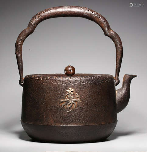 AN IRON POT CARVED WITH AUSPICIOUS PATTERN