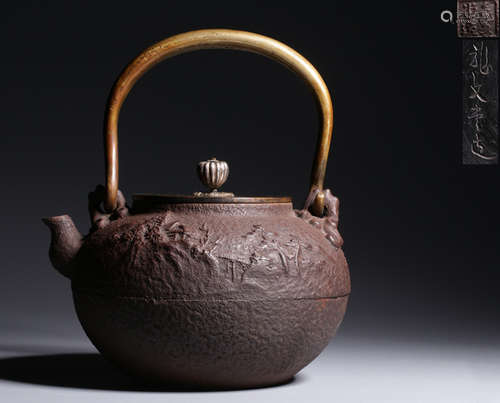 AN IRON POT WITH MARK