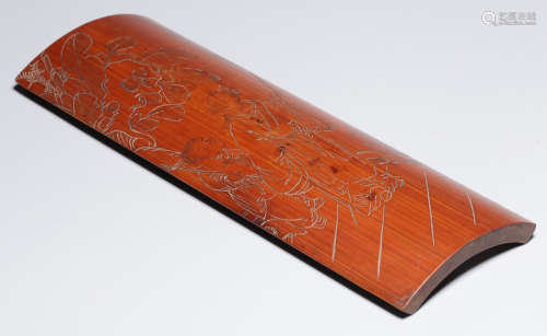 A BAMBOO ARM REST CARVED WITH STORY PATTERN