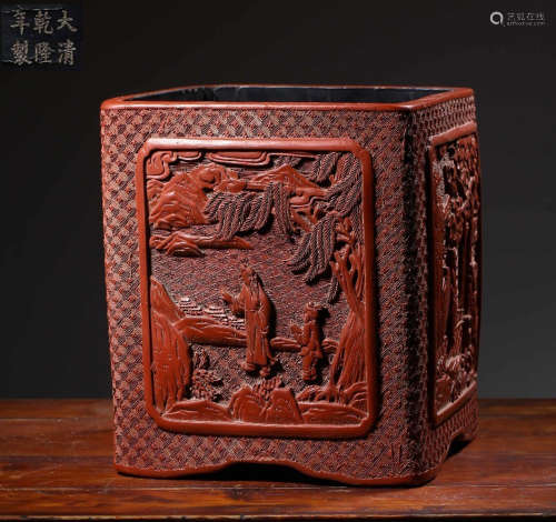 A RED LACQUER BRUSH POT CARVED WITH STORY PATTERN