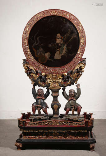 A LACQUER SCREEN CARVED WITH FIGURE