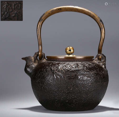 AN IRON POT CARVED WITH LANDSCAPE