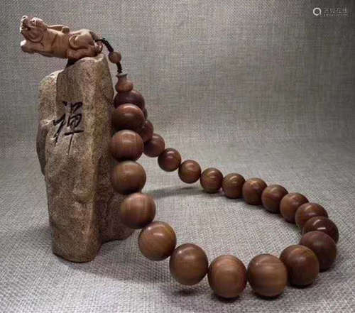 A ZITAN WOOD STRING BRACELET