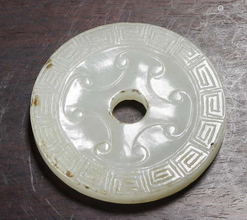 A HETIAN WHITE JADE BI CARVED WITH PATTERN