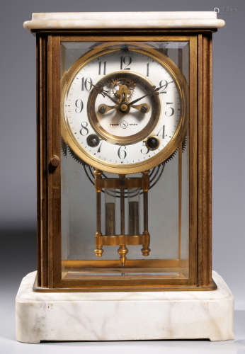 A COPPER CLOCK WITH WOOD FRAME
