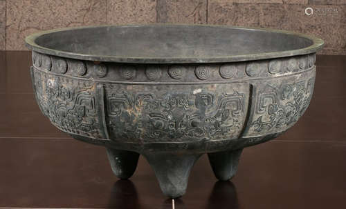 A COPPER CONTAINER CARVED WITH BEAST PATTERN