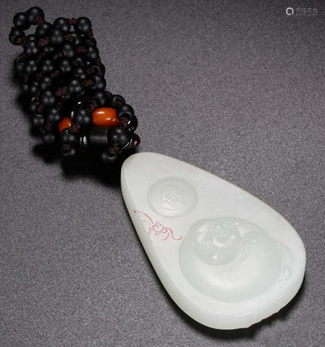 A HETIAN JADE CARVED MAITREYA BUDDHA PENDANT