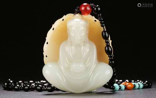 A HETIAN JADE SHAKAMUNI BUDDHA PENDANT