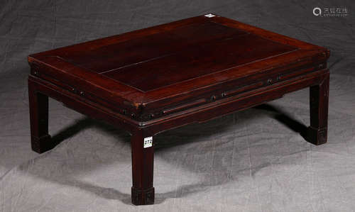 A HUALI WOOD TABLE