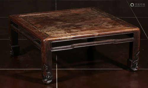 A HUALI WOOD TABLE