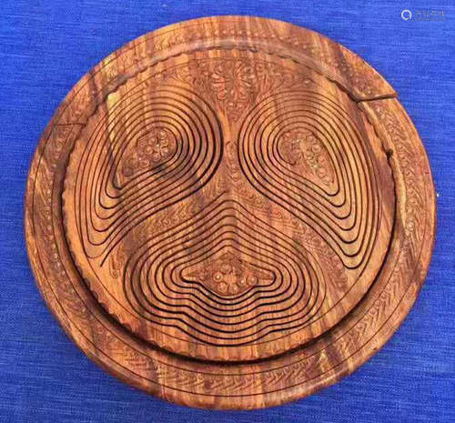 A HUALI WOOD PLATE