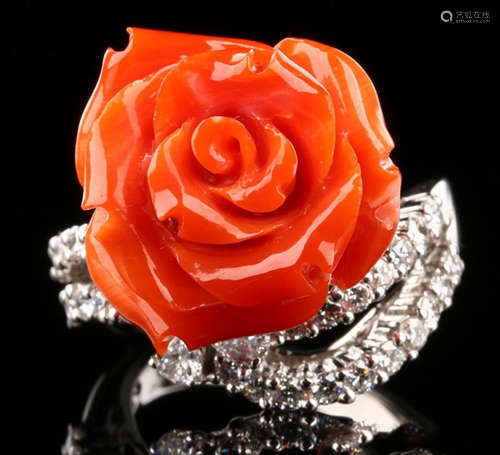 A CORAL AND DIAMOND RING WITH PLATINUM