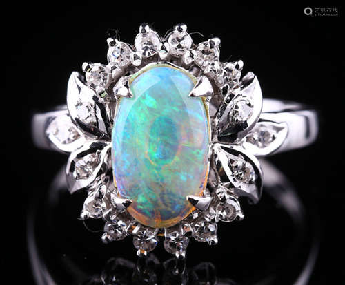 A OPAL AND DIAMOND RING WITH PLATINUM