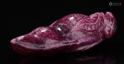 A RUBY PENDANT SHAPED WITH MELON