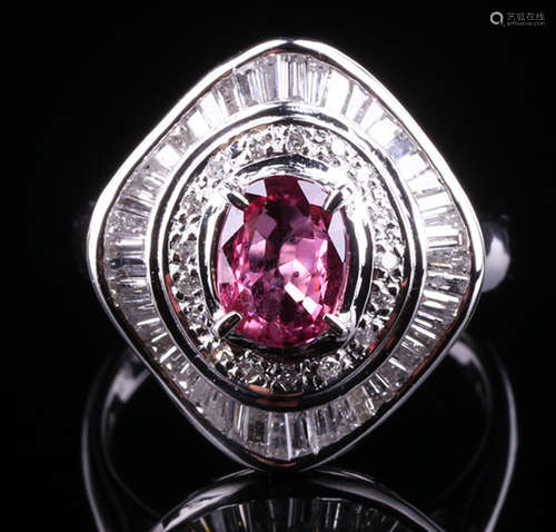 A RUBY AND DIAMOND RING WITH PLATINUM