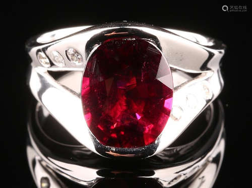 A RUBY AND DIAMOND RING WITH PLATINUM