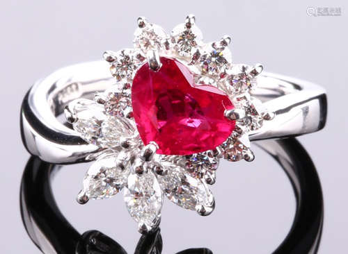 A RUBY AND DIAMOND RING WITH PLATINUM