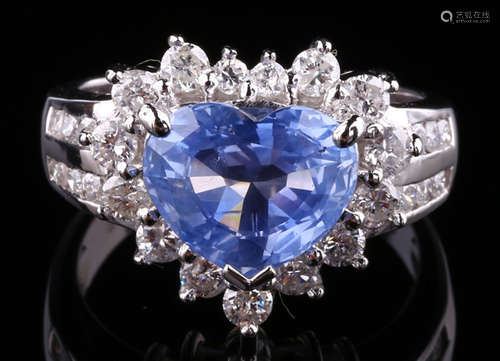 A SAPPHIRE AND DIAMOND RING WITH PLATINUM