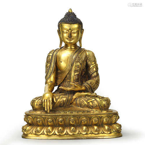 A Gilt Bronze Figure of Sakyamuni Buddha with