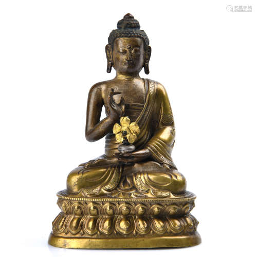 A Gilt Bronze Figure of Sakyamuni Buddha