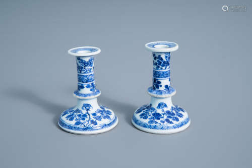 A pair of Chinese blue and white candlesticks with floral design, Kangxi
