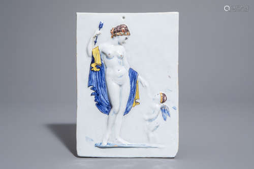 A polychrome Dutch Delft relief moulded 'Artemis and Cupid' plaque, 18th C.