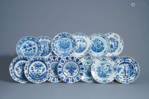 A collection of fourteen Dutch Delft blue and white plates, 18th C.