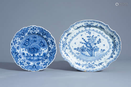 A Dutch Delft blue and white 'Tea tree' dish and an oval platter with floral design, 18th C.