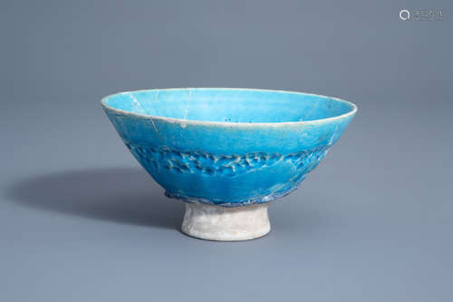 A turquoise glazed bowl, Kashan, Iran, 13th C.