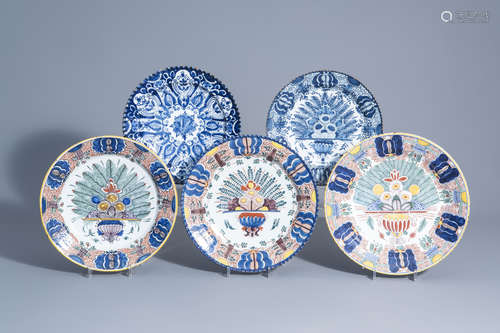 Five Dutch Delft blue, white and polychrome chargers with floral design, 18th/19th C.