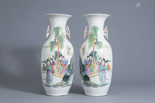 A pair of Chinese famille rose vases with ladies on a terrace, 19th/20th C.