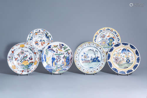 Six Dutch Delft blue, white and polychrome chargers with floral and chinoiserie design, 18th/19th C.